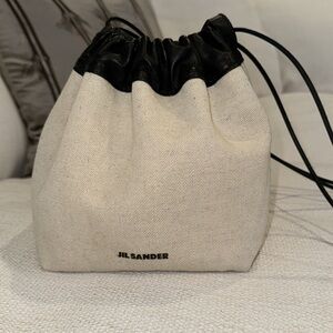Jil Sander Black and Cream Drawstring Bag